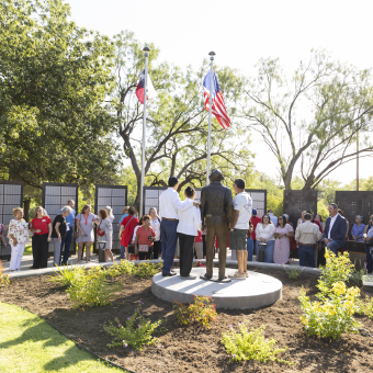 Crowd with statue